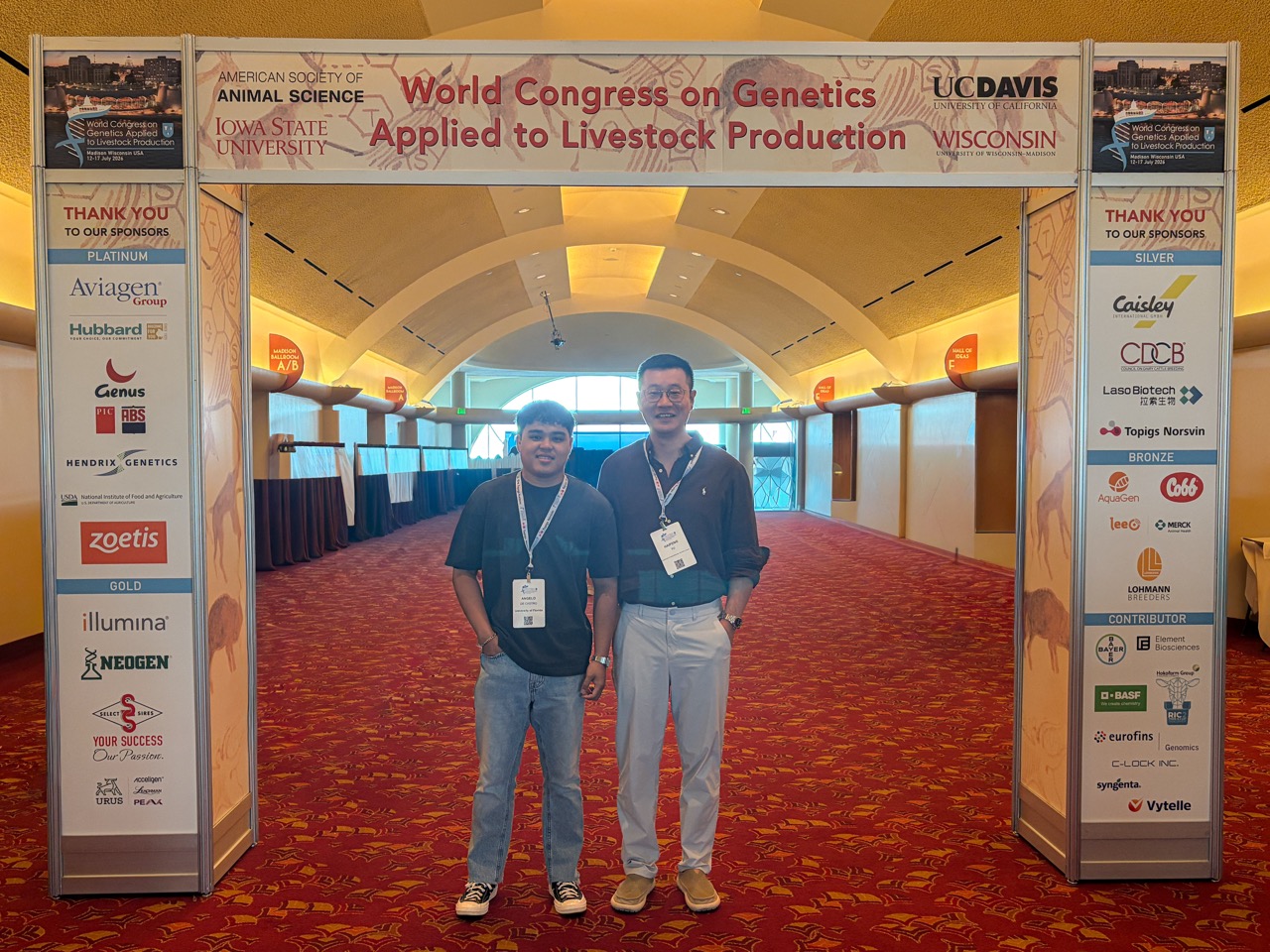 Angelo De Castro with his advisor Dr. Haipeng Yu at the WCGALP conference entrance